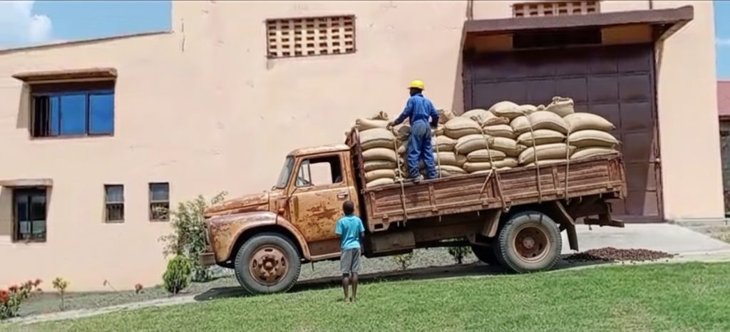 Truck loaded with coffee sacks.